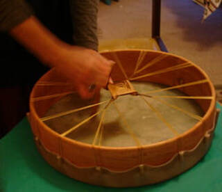Diana Halfmann shamanic counselor making a drum